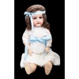 Heubach Koppelsdorf: A bisque head, socket girl doll, marked 'Heubach Koppelsdorf 250.1 Germany',