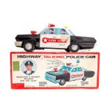 Yonezawa: A boxed Yonezawa, Highway Talking Police Car, friction powered car, tinplate.