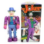 Billiken: A boxed Billiken, Mechanical Joker, 1989, swing arms, wind-up, complete with key,