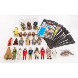 Star Wars: A collection of assorted loose figures, most with cards to include: Logray (Ewok Medicine