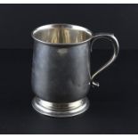 A silver mug, by Adie Brothers Ltd, assayed Birmingham 1926, of circular tapering form with scroll