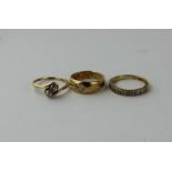 A collection of three 18ct. yellow gold and diamond set rings, to include; an 18ct. yellow gold