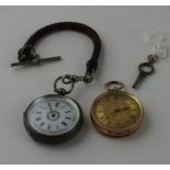 An 18ct. gold ladies' pocket watch, key wind, having round dial with Roman numeral chapter ring