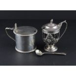 A Victorian silver drum mustard, by Edward Hutton, assayed London 1890, having hinged and gently