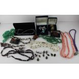 A collection of costume jewellery, to include: a variegated semi-precious gemstone necklace and drop
