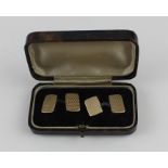 A pair of 9ct. yellow gold rectangular cuff links, by Owen Powell, assayed Birmingham 1936, with