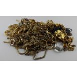 A large collection of yellow metal and gold plated costume jewellery. (Qty)