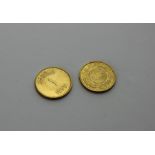 Two Saudi Arabian guinea coins, 1950 and 1957, both 22ct. gold, 7.98g when minted. (2)