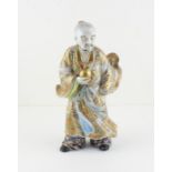 A Japanese Meiji period porcelain figure of a warrior,