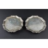 A pair of Georgian II small silver salvers/card trays, maker "P.G" (unidentified), assayed London