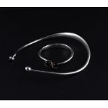 A Bent Larsen Danish modernist design silver choker and bangle set, each impressed "Sterling,