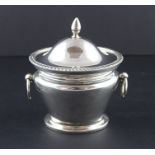 A heavy silver oval sucrier, by Robert Pringle & Sons, assayed London 1912, having hinged cover with