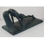 An art deco period  plaster sculpture of a female posing nude, signed Renand.