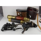 A 19th century brass and mahogany bound three drawer telescope, with leather lens cap, length