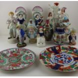 A collection of Staffordshire figures and similar.