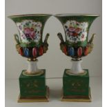 A pair of champagne urns