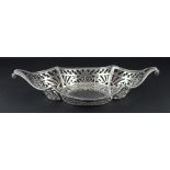 A silver basket, by Sibray, Hall & Co Ltd, assayed London 1903, of navette shape, having pierced