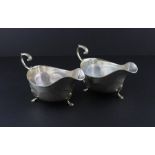 A pair of silver sauceboats, by Aldie Brothers Ltd, assayed Birmingham 1924, of traditional form,