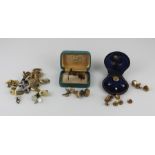 A collection of gold, yellow metal and silver gilt gentleman's dress shirt studs, buttons and cuff