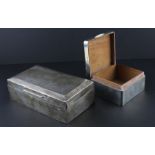 Two silver cigarette boxes, to include one by Stuart Clifford & Co, assayed London 1913, of near