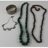 A small collection of costume jewellery, to include; A string of graduated malachite beads, a string