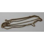 A yellow metal three chain necklace, of graduated lengths, each formed from faceted links, (yellow
