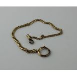 A yellow metal flat curb link chain, indistinct marks, (yellow metal assessed as 18ct. gold), length