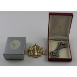 A Christian Dior gilt brooch, impressed "ChrDior" and "Germany", width 65mm, in Dior card box,