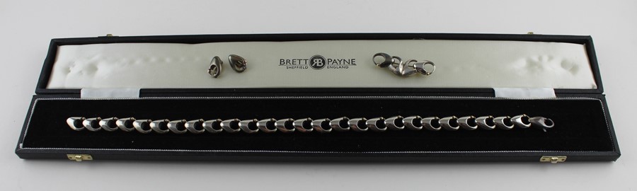 A Brett Payne silver and  choker necklace, brooch and earrings en suite, c.1995-6, having heavy