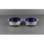 A pair of Robinson & Co Ltd (Singapore & Kuala Lumpur) silver plated circular butter dishes, each