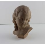 Corinne Gobet (contemporary), a terracotta bust of a young woman, signed, height 17cm.