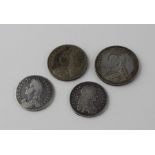A collection of four English silver coins, to include; A 1663 Charles II silver halfcrown, first