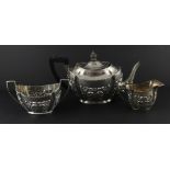 A Victorian silver three piece tea service, by George Nathan & Ridley Hayes, assayed Chester 1897,