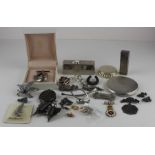 A collection of silver jewellery, to include; A late 19th century white mixed metal bar brooch,