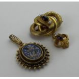 A Victorian yellow metal brooch, fashioned as a knot formed of repouuse floral decorated and plain