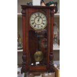 A late Victorian walnut eight day Vienna wall clock, the dial inscribed S&F,