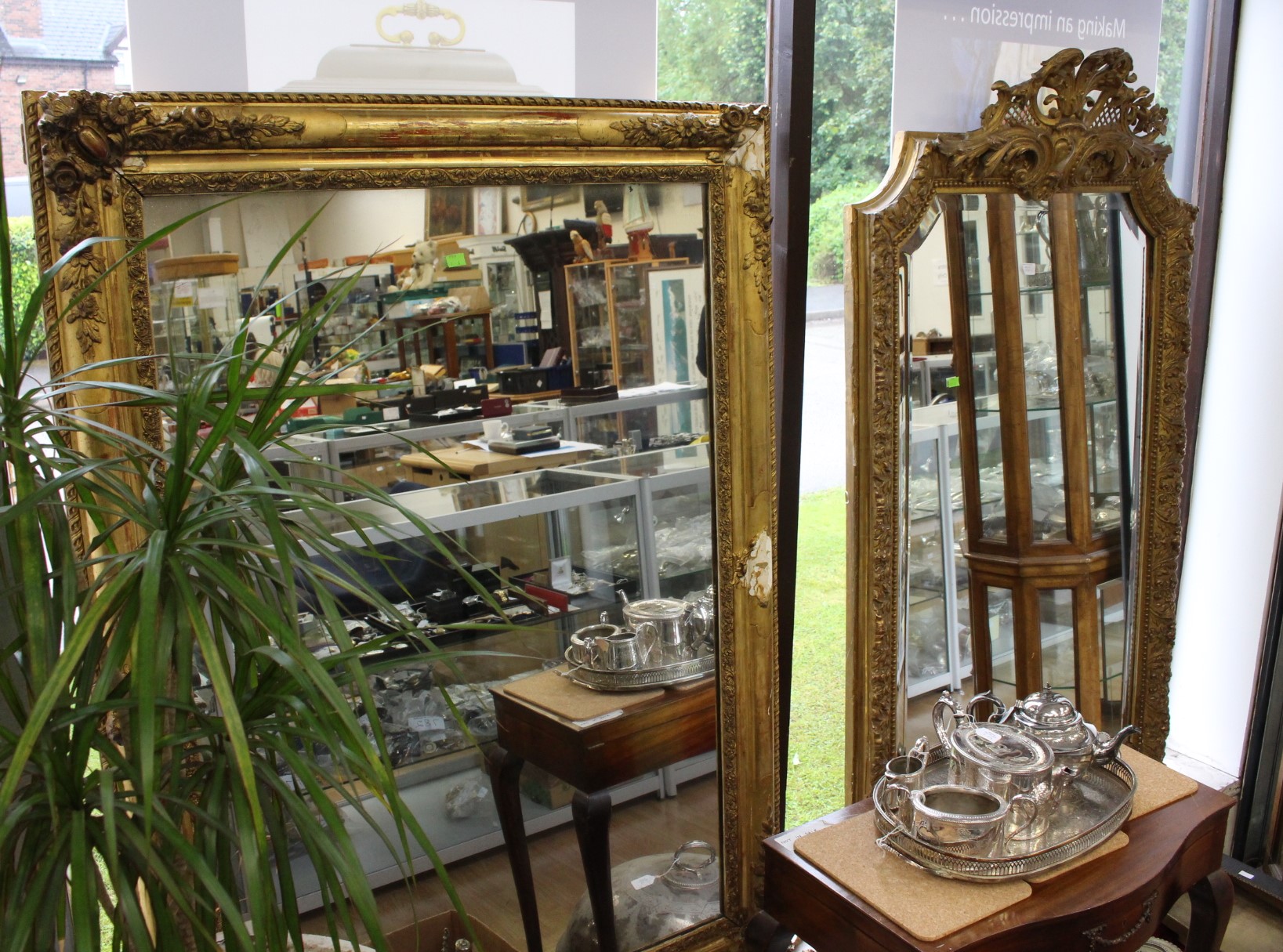 Two Victorian large sized gilt framed wall mirrors