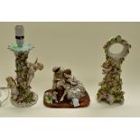Porcelain Continental lamp with mantle clock and figure group,