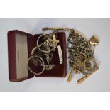 A collection of costume jewellery to include unmarked 9ct gold earrings, silver and abelone brooch,