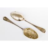 A pair of George III silver berry spoons, London 1818, possibly later chased, 104.43 grams / 3.