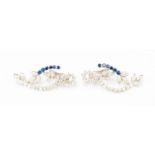 A pair of diamond and sapphire 18ct white gold solid drop earrings,