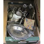 A collection of assorted plated ware, including a pair of flared vases, a two branch candelabra,