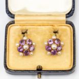 A pair of 9ct gold amethyst and pearl cluster clip earrings complete with box