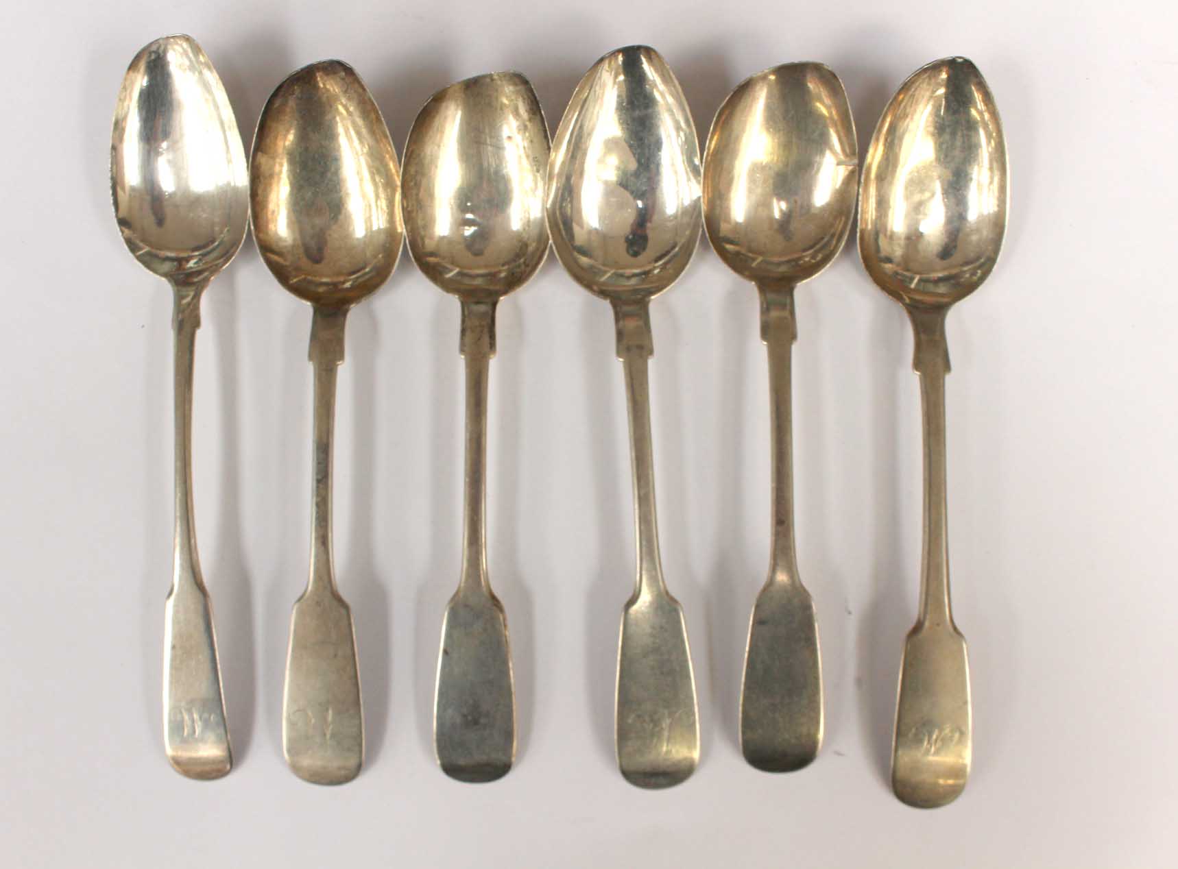 A set of four William IV silver table spoons, hallmarked for Newcastle 1837,