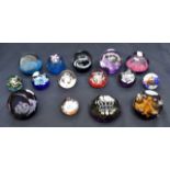 Small collection of late 20th Century decorative glass paperweights, Caithness the majority,