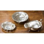 An Edwardian silver sauceboat, wavy rim, on three cabriole legs, maker JJ,