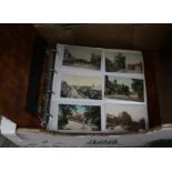 Collection of postcards in three albums,