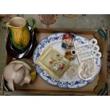 A miscellaneous collection of ceramics including meat platter; pig biscuit barrel; top hat cooler;