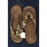 A pair of Indian Slippers. Brown fabric body with painted Floral decoration.