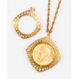 A 1911 George V gold sovereign in 9ct gold pendant mount,